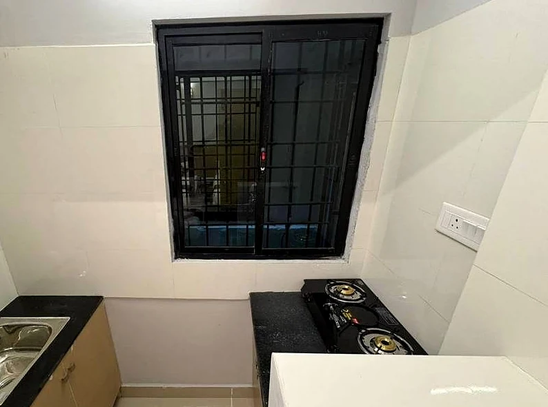 In-room kitchenette with stove and sink